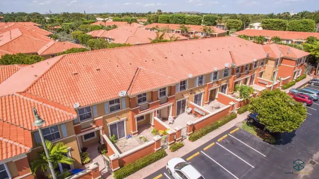 Aerial-View-Of-Red-Tile-Roof-On-Townhome-Community